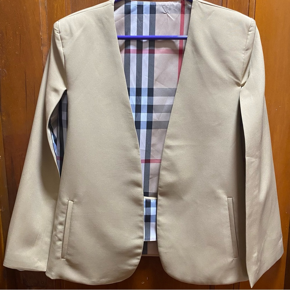 Pancho/blazer size Medium khaki color. Elegant and formal.